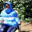 Julia tied and gagged in a shiny nylon downjacket