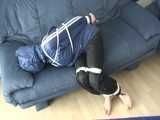 Get 3 classic archive videos with Katharina bound and gagged in shiny nylon rainwear