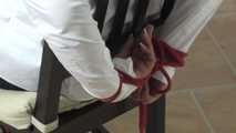 Jasmin roped to chair 2/2