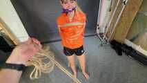 Lana bound and gagged in shiny Shorts and Windbreaker 