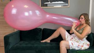 Blow2Pops custom red Longneck balloon in bra