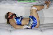 Sandra bound and gagged wearing a shiny wetlook Cheerleader Dress