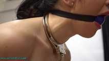 Chained and cuffed to the chair