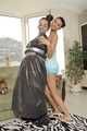 Elvina and Xenia - tied Xenia is packed in trash bags by Elvina