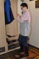 Lagenweise Regenkleidung und Bondage