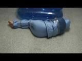 0300 min video with Simone tied and gagged in shiny nylon sky suit 