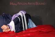 Watching Pia wearing blue/pink shiny nylon rainwear being tied and gagged and hooded with tape and a clothgag (Pics)