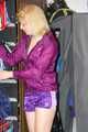 Pia enjoying a cupboard full of shiny nylon clothes trying on purple shiny nylon shorts and rain jacket (Pics)
