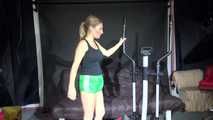 Watching sexy Sandra during her workout wearing a sexy green shiny nylon shorts and a black top (Video)