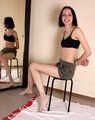 Emily bound with rope, sittin on the stool