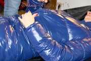 Pia lying on the bed wearing a sexy rainpants anda bra and putting on a pamy down jacket (Pics)