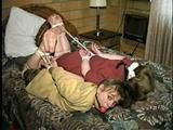TUBE, BALL, CLEAVE, WRISTS GAGGED & HOG-TIED CARRIE & DEB (D18-2)