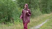 Miss Petra takes a walk in an AGU rain suit and rubber boots (looped version)