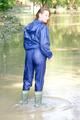 Stella jumping in puddles wearing sexy blue shiny nylon rainwear and rubber boots (Pics)