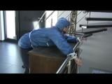0318 min video with Jill tied and gagged in shiny rainwear