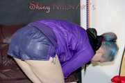 Mara wearing a sexy purple shiny nylon shorts (selfmade) and a rain jacket during preparing her sofa (Pics)