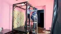 Breathplay Sebastien tied to an iron structure.