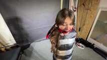 Poor Marie bound and gagged in a shiny nylon Windbreaker