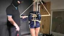 Marie bound, gagged and spanked in shiny nylon Shorts and a Windbreaker