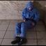 Jill tied, gagged and hooded in an old dungeon/cellar with handcuffs wearing sexy lightblue downwear (Video)