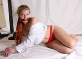Cleavegagged barefoot topless Albina Rose in unbuttoned white shirt and red panties, bound with hemp rope, poses for the camera