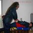 Jill tied and gagged by Petra both in shiny nylon rainsuits