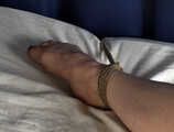 Ballgagged topless barefoot Wanda in only black panties, tied on the bed with her legs wide-spread, wiggles helplessly