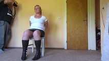 Cuffed on a chair 001