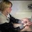 Sonja ties and gagges herself in a bath tub wearing a black shiny nylon shorts and a rain jacket (Video)