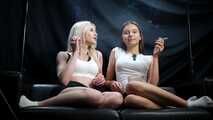 Two Beautiful Girls Smoking Together in white socks
