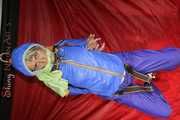 Sexy Sonja being tied and gagged with ropes and a clothgag hanging wearing a sexy rainwear combination (Pics)