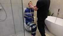 Myxxxy surprised by an Intruder in her Bathroom finally bound and gagged in Rainwear