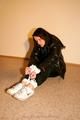 One of our archive girls bound and gagged in shiny nylon down