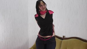 Daphne tied with ropes on sofa 2/2