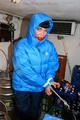 Jill tied and gagged in a down jacket