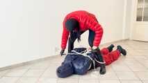 Breathplay Sebastien in a puffer jacket in hogtied.
