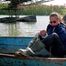 Stella tied and gagged outdoor on a boat wearing a supersexy blue shiny nylon rainwear (Pics)