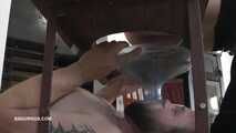 Tatjana peeing in the slave's mouth and instructing the subgirl to do the same