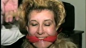 44 Yr OLD HOUSEKEEPER IS PANTY LESS, MOUTH STUFFED WITH STINKY NYLON STOCKING, TOE TIED & 4 CLEAVE GAGS (D40-13)