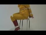 03:00 Min. video with Jill tied and gagged in a shiny nylon yellow rainsuit