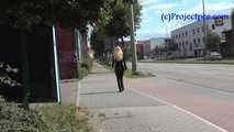 069017 Tiffany Pees Behind A Parked Trailer