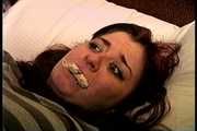 23 YR OLD REAL ESTATE BROKER IS MOUTH STUFFED WITH A SPONGE, WRAP TAPE GAGGED, GAG TALKING, RAG STUFFED IN MOUTH AND TIGHTLY HANDGAGGED  (D74-15)