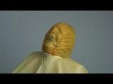 Jill tied and gagged on a chair wearing a yellow rainsuit and coveres with an yellow raincoat with two hoods (Video)