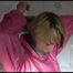 Sonja ties and gagges herself in the bath tub with cuffs wearing sexy shiny nylon downwear (Video)