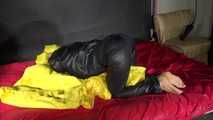 Sexy Sandra wearing sexy shiny nylon rainwear lolling in bed of nylon (Pics)