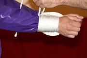 Isabelle tied and gagged in shiny nylon clothes