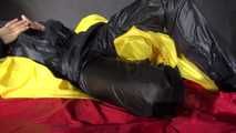 Sexy Sandra wearing sexy shiny nylon rainwear lolling in bed of nylon (Pics)