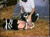 BOUND IN BLACK PANTIES, DRESS, GARTER BELT, HEELS & CLEAVE GAG SUZIE (D24-14)