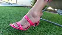 pink heels dangling