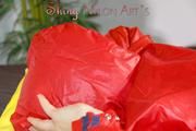 Lucy wearing a sexy shiny nylon shorts and two rain jackets feeling breath control (Pics)